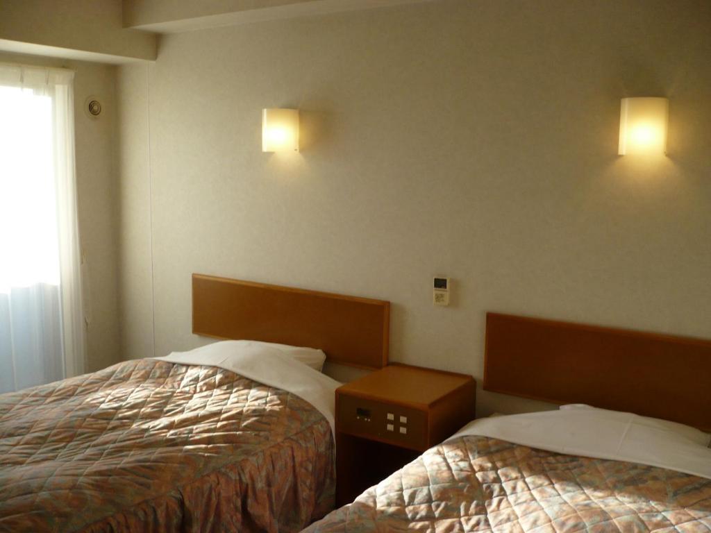 Hotel New Budget Muroran Szoba fotó